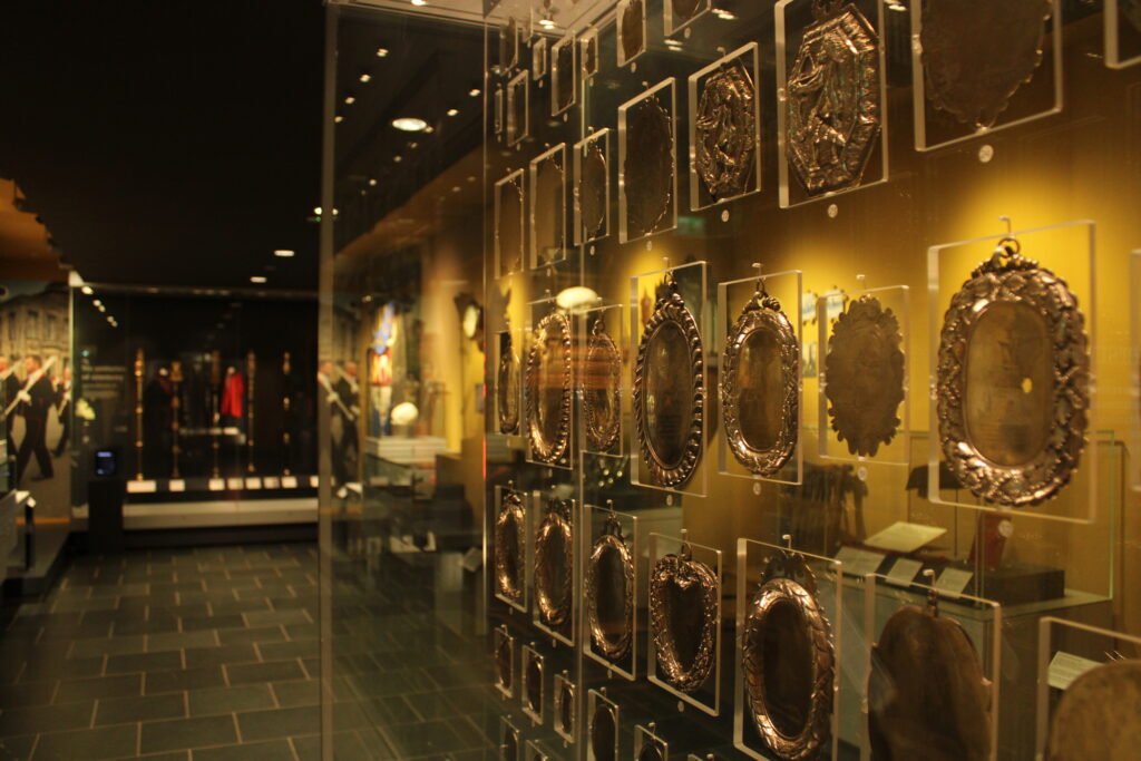 Medals on display in the gallery.